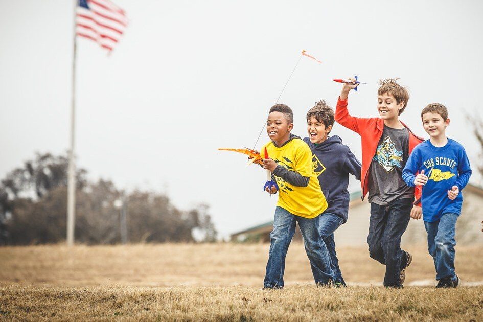 Cub-Scouts-running-with-rockets