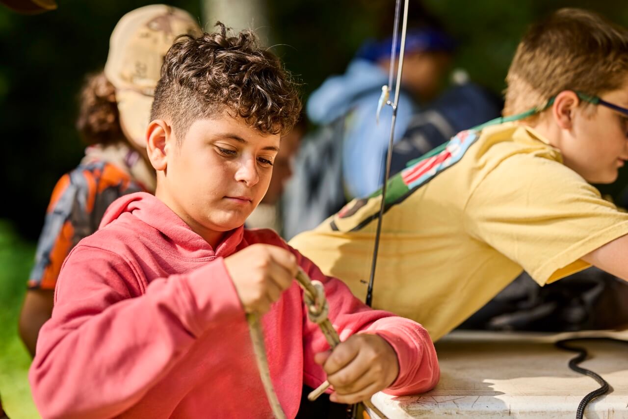 Cub Scouts enjoying an outdoor activity at camp