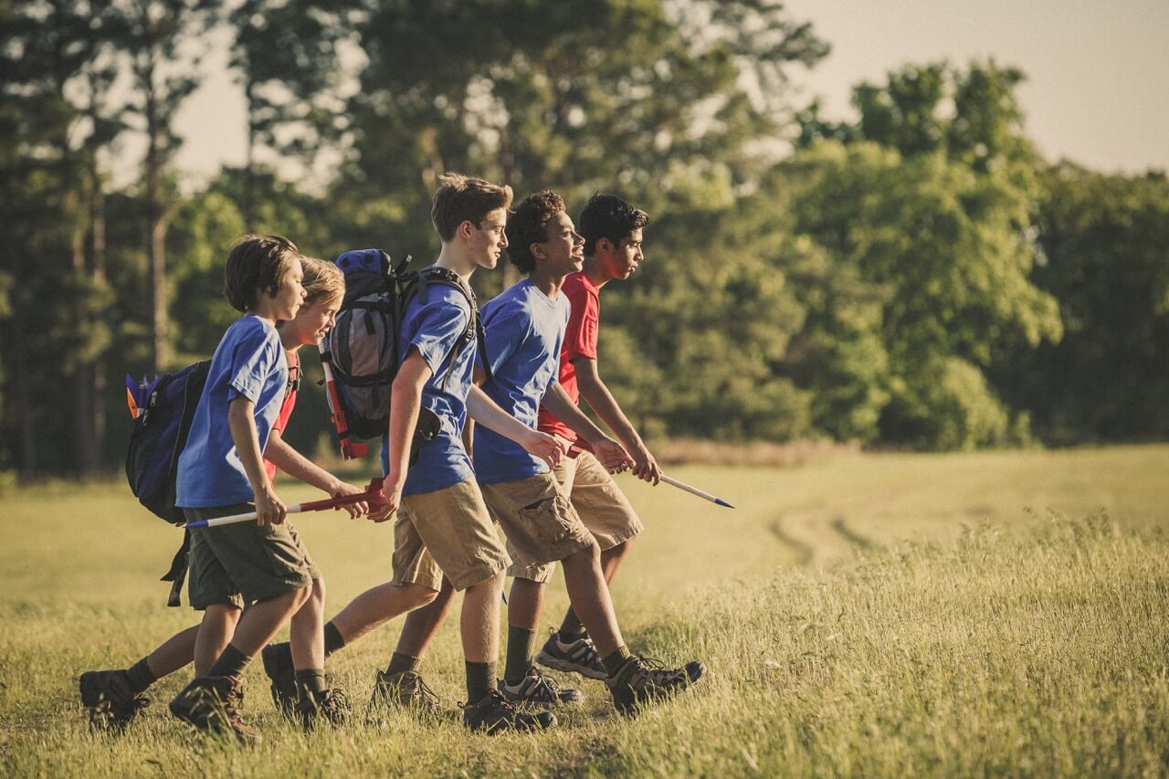 Cub Scout trying a hands-on activity